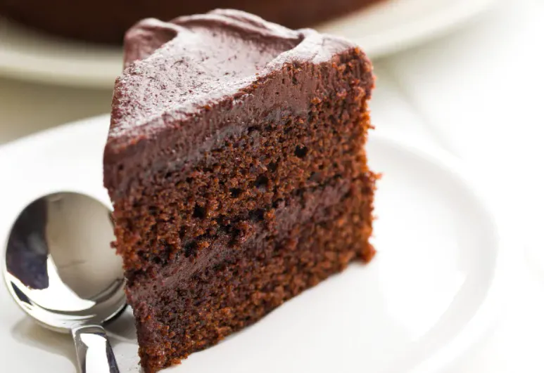 {'en': 'Chocolate cake', 'es': 'Tarta de chocolate'} Image