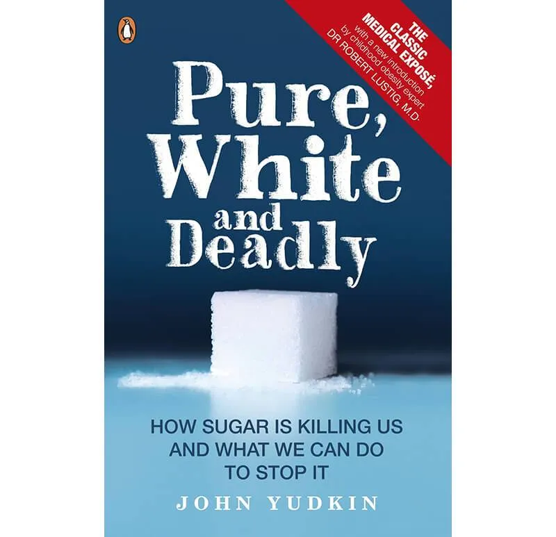 {'en': 'Reading the book "Pure, White and Deadly" by John Yudkin.', 'es': 'Lectura del libro "Pure, white and Deadly" de John Yudkin.'} Image