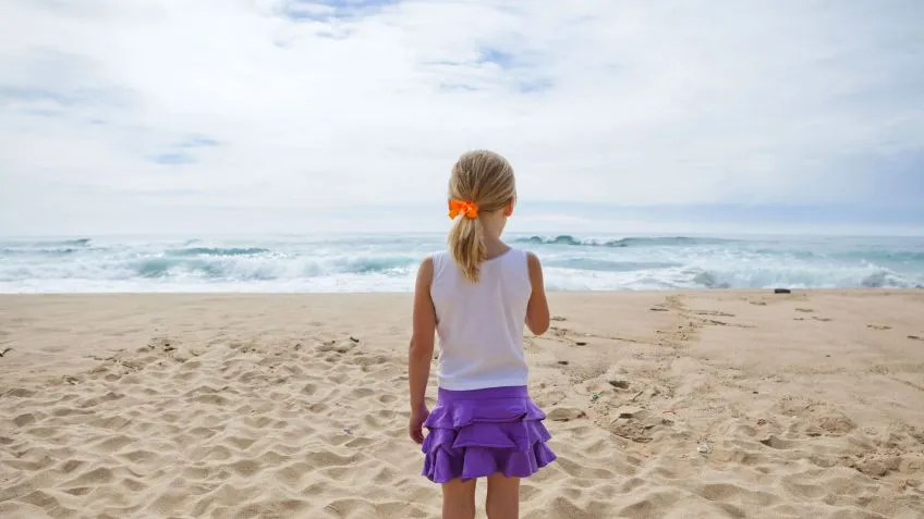 {'en': 'Insulin pump and beach', 'es': 'Bomba de insulina y la Playa'} Image